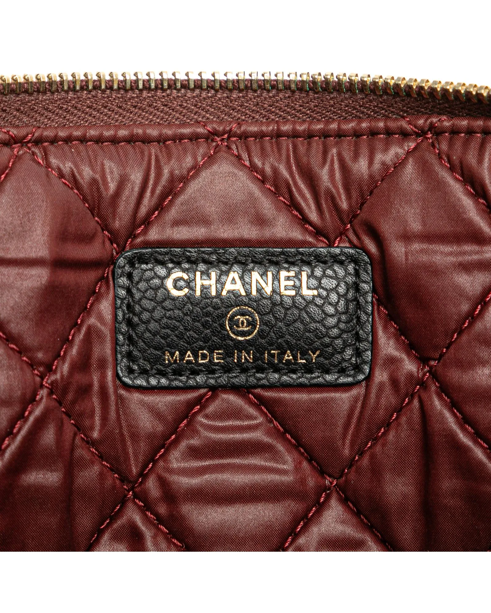 Quilted Caviar Leather Clutch with Zip Closure and Pockets