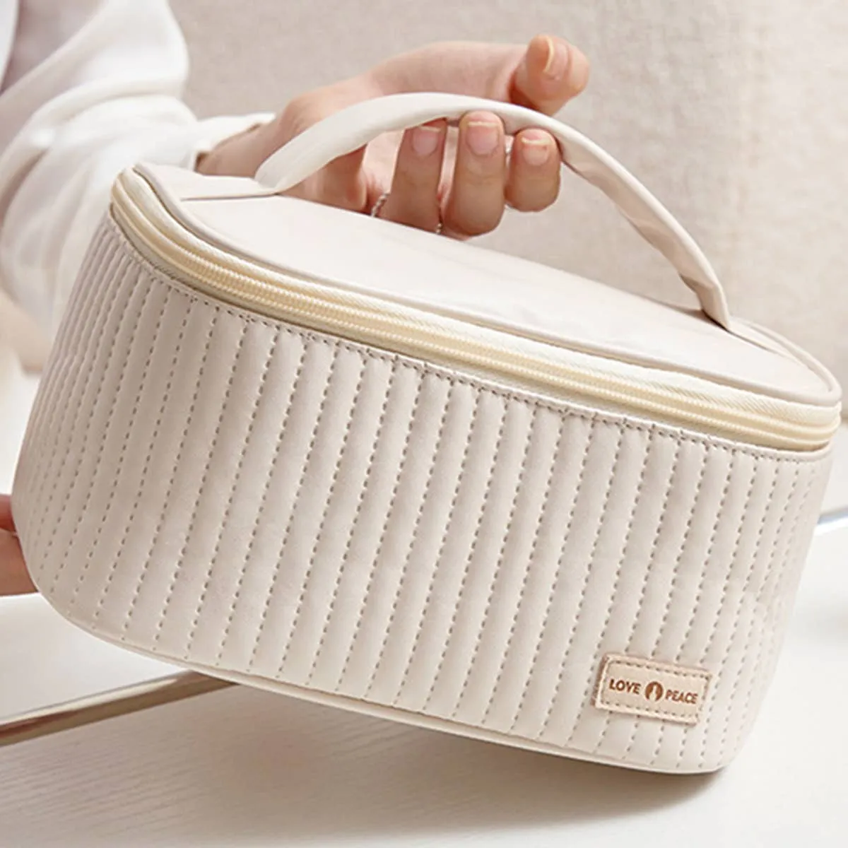 Quilted Oval Make Up Case